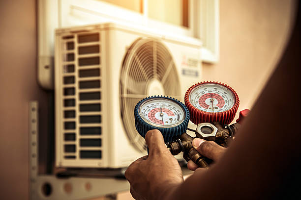 Professional Heat Pump Repair technician working in Bolckow, MO